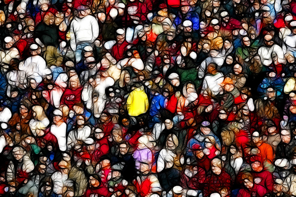 A densely packed crowd of people in colorful clothing